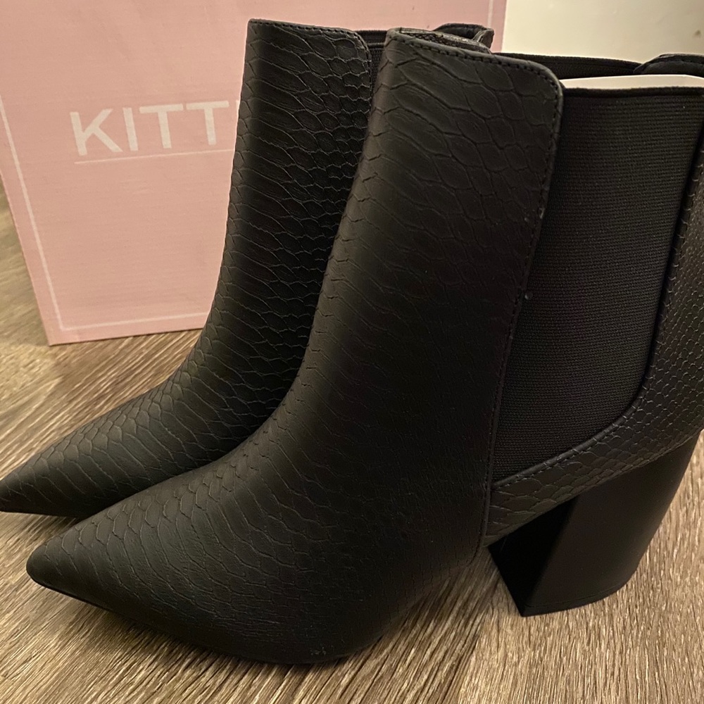 Black snakeskin booties